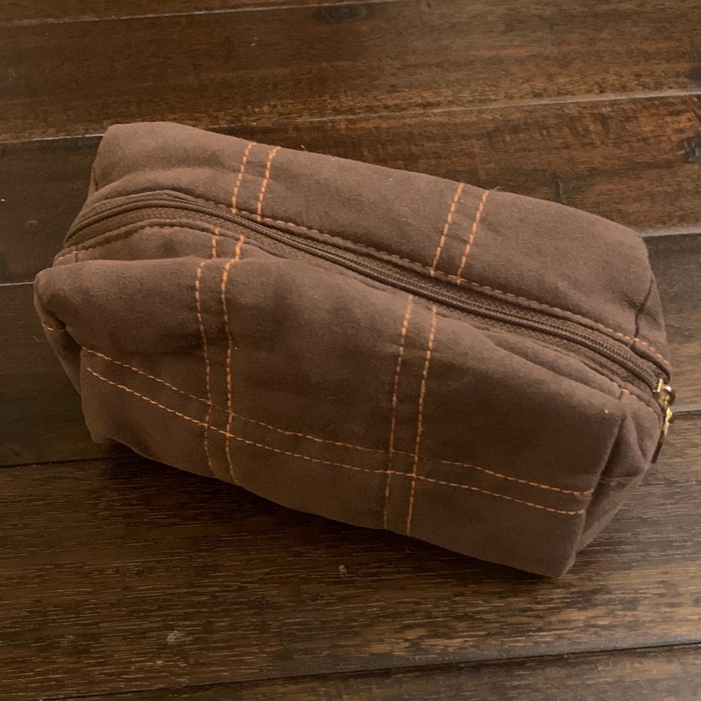 Darphin Paris Brown Velvety Toiletry Bag with orange lining